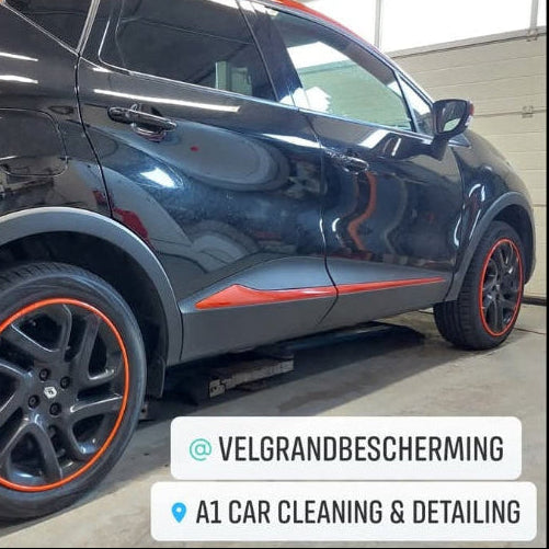 alloygator gemonteerd op auto, oranje kleur